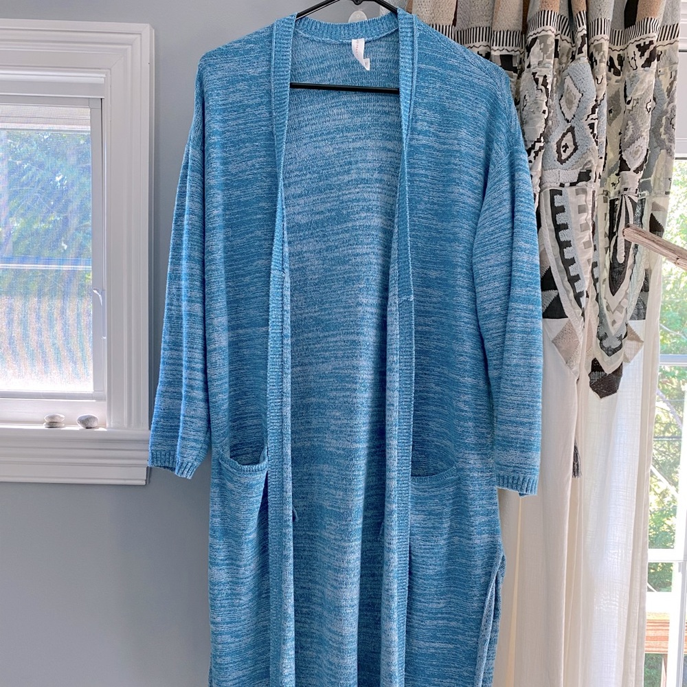 Anthropologie brand Daily Practice long sweater duster in a pretty turquoise.